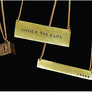 Hand engraved recycled brass bar necklace