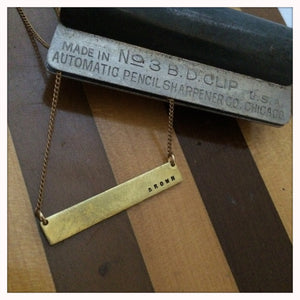 Hand engraved recycled brass bar necklace