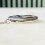 Sterling silver starburst and turquoise round locket necklace