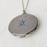 Sterling silver starburst and turquoise round locket necklace