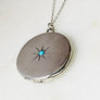 Sterling silver starburst and turquoise round locket necklace