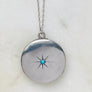 Sterling silver starburst and turquoise round locket necklace