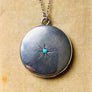 Sterling silver starburst and turquoise round locket necklace