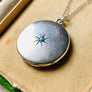 Sterling silver starburst and turquoise round locket necklace