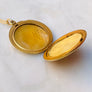antique locket gold grape bird photographs