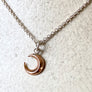 Small crescent moon pendant necklace