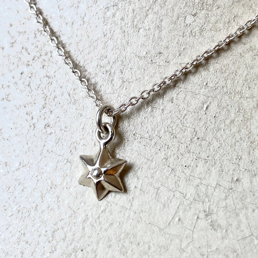 Small six pointed star pendant necklace