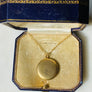 Plain matte gold-shell round Victorian locket necklace