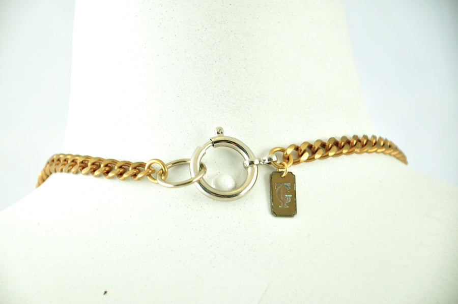 clasp and vintage brass chain on Long Tessellated Rhinestone Bib Statement Necklace.