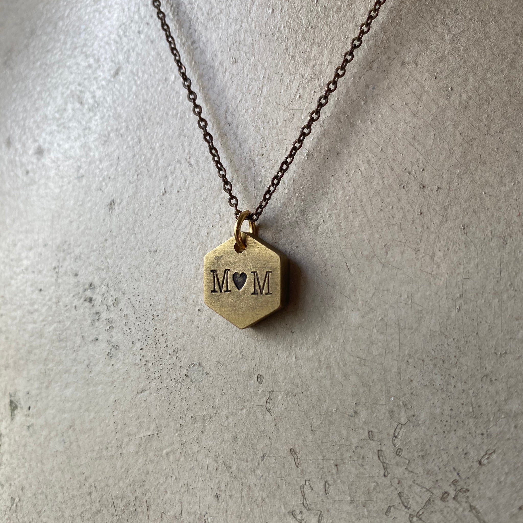 Stamped pendants store