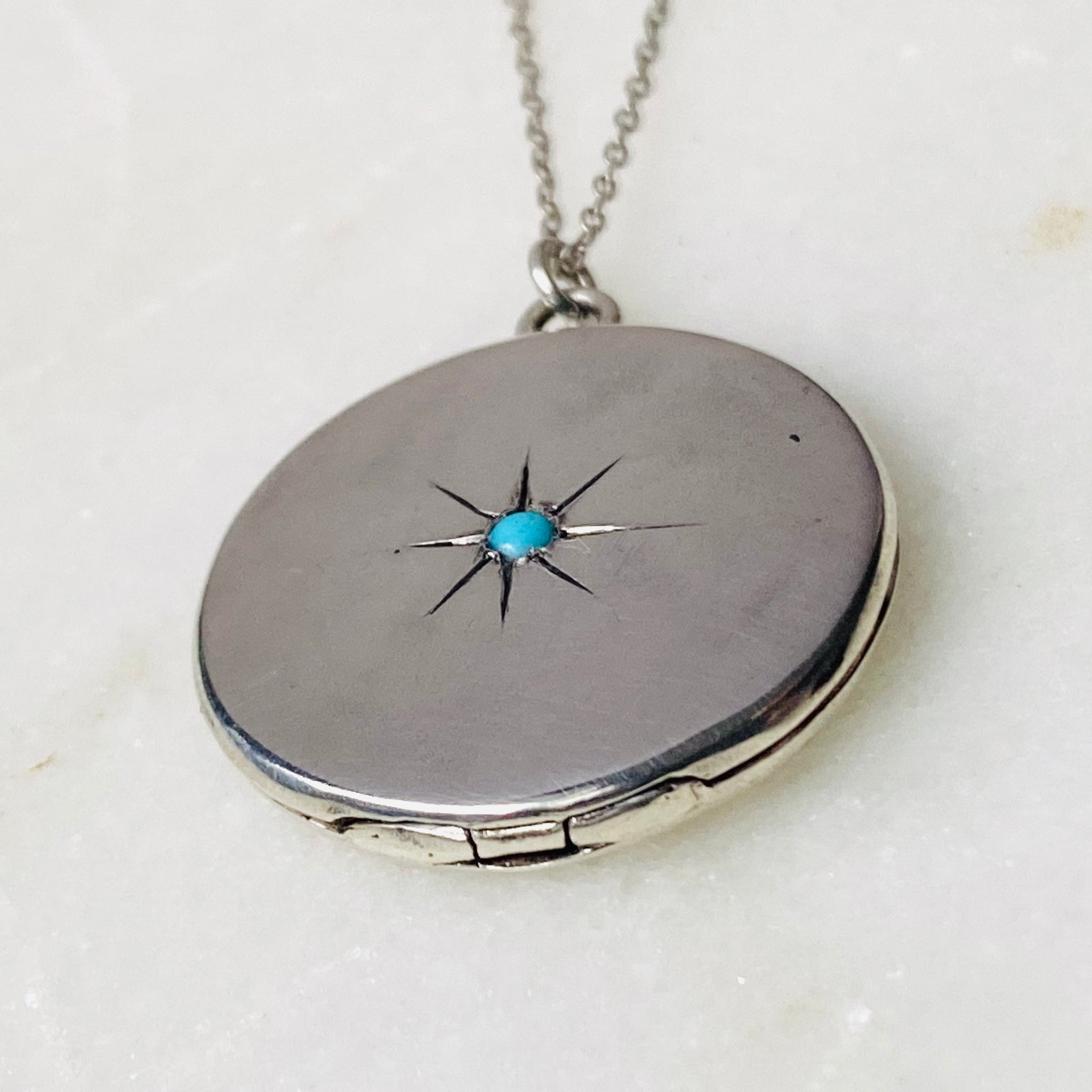 Sterling silver starburst and turquoise round locket