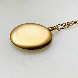 Plain matte gold-shell round Victorian locket necklace