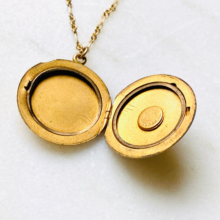Plain matte gold-shell round Victorian locket necklace